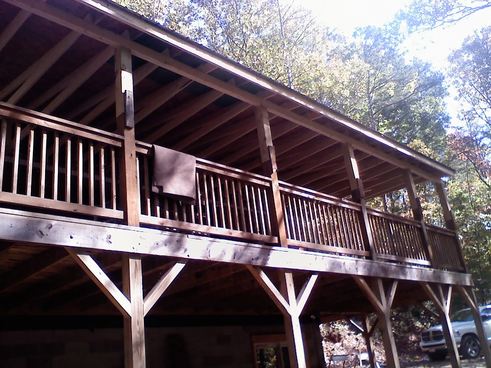 Timber framing under a new elevated porch and deck — Roof Leak Repair in Kearsarge by Roofing Brothers